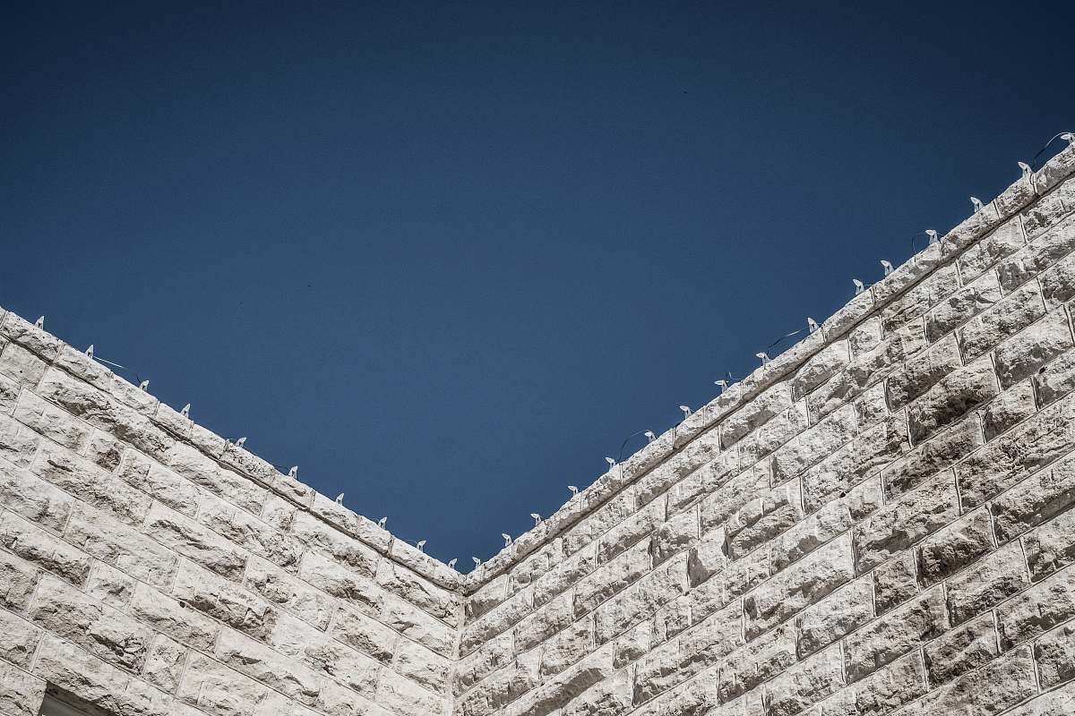 grey low angle photography of gray concrete wall at daytime georgetown